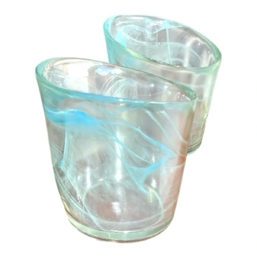 Blue swirl tea light holders with asymmetrical edges, unsigned